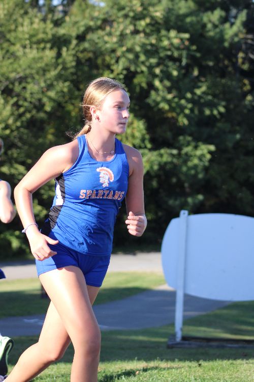 Student Athlete running in blue uniform